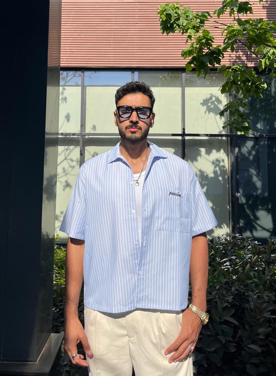 baby blue -striped shirt